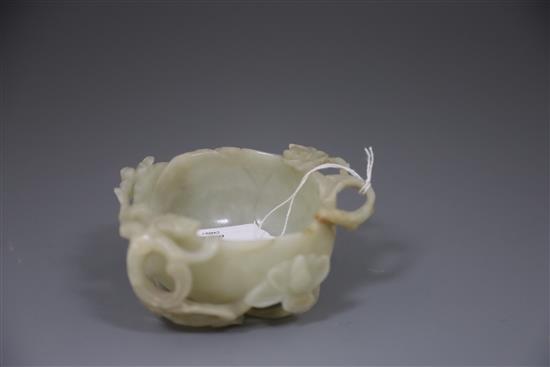 A Chinese pale celadon jade lotus cup, late Ming dynasty,